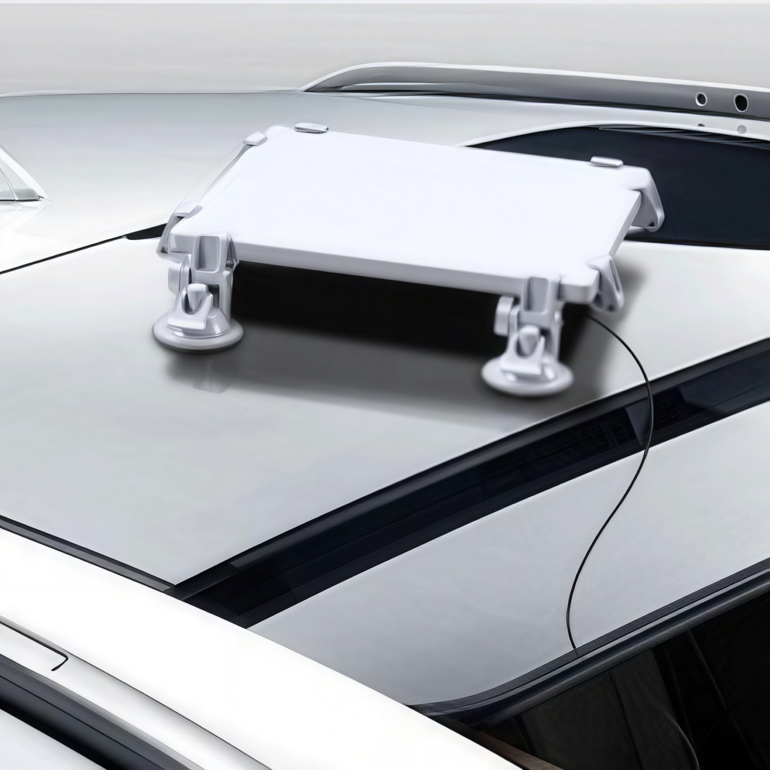 Starlink Mini suction cup mount installed on smooth vehicle surface