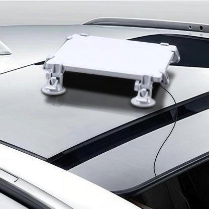 Starlink Mini suction cup mount installed on smooth vehicle surface